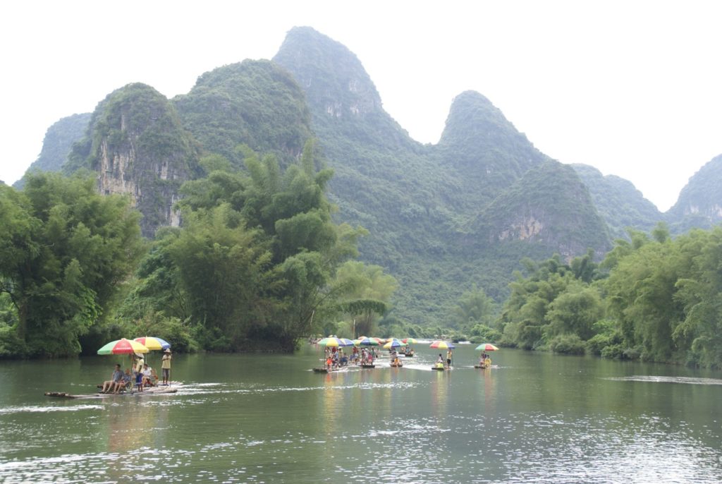 BAMBOO RAFTS FLOATING DOWN THE YULONG RIVER