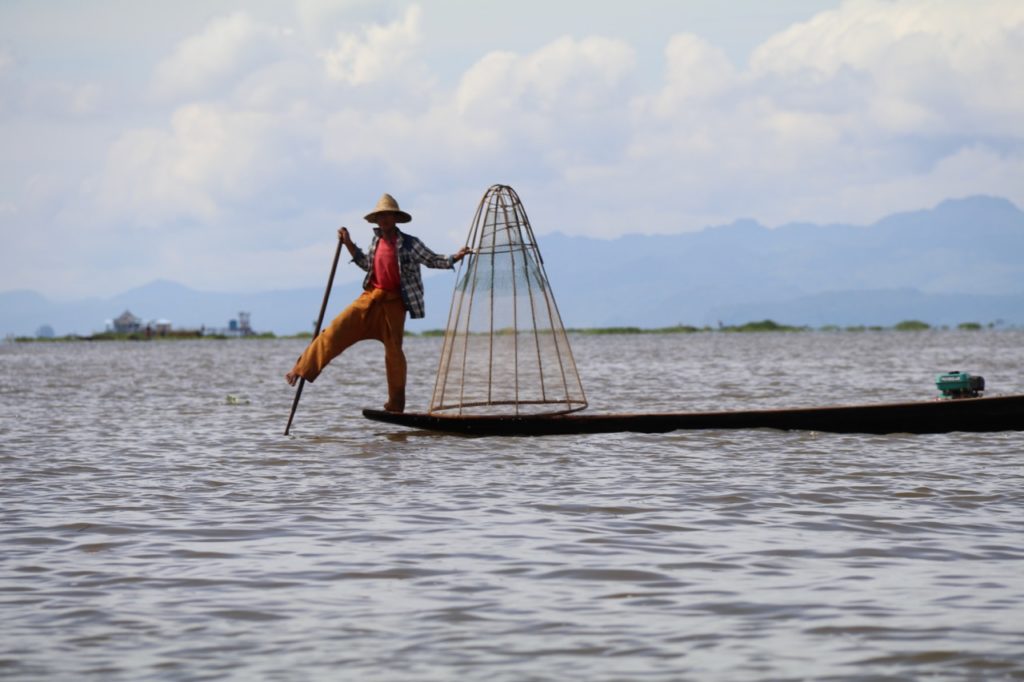 A fisherman on Inle Lake - they row with one foot!