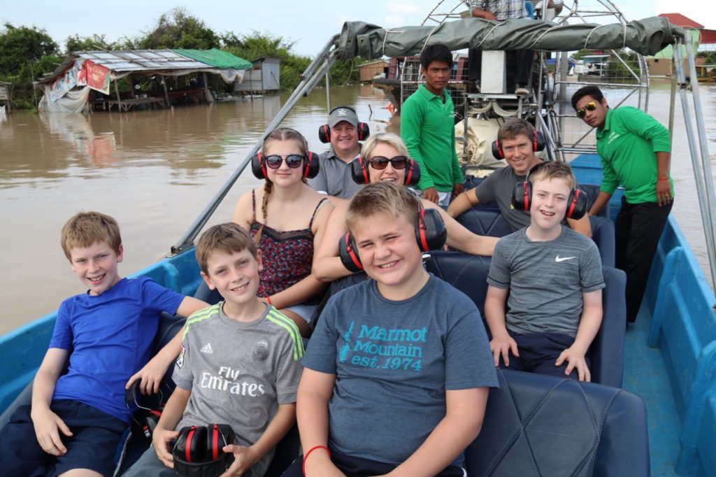 Riding an airboat on Tonle Sap Lake