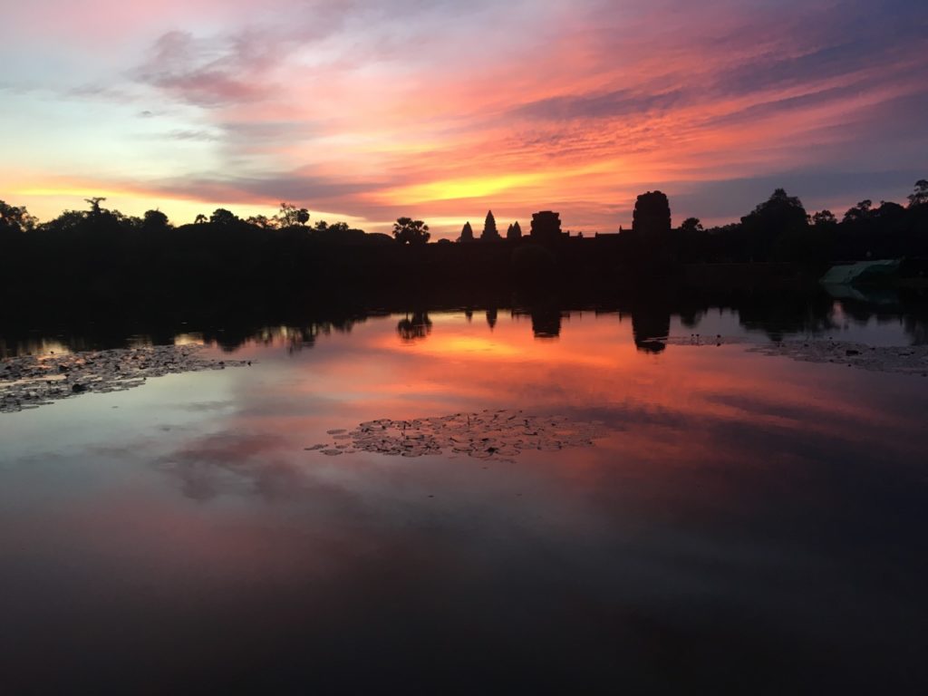 Watching the sun rise at Angkor Wat in Cambodia