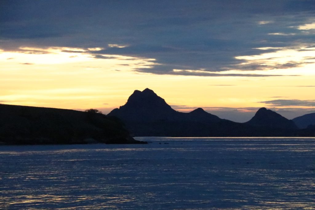 Setting sun near Komodo Island