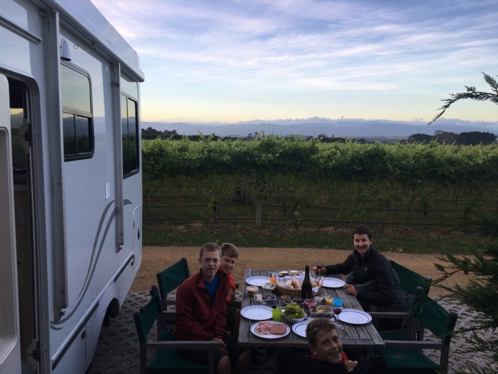 Enjoying dinner with a view of the vineyard at Coney Wines in Martinborough