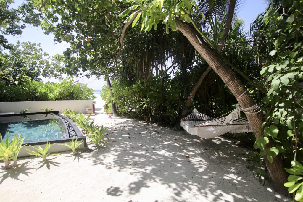 Family beach villa at Constance Haleveli Maldives