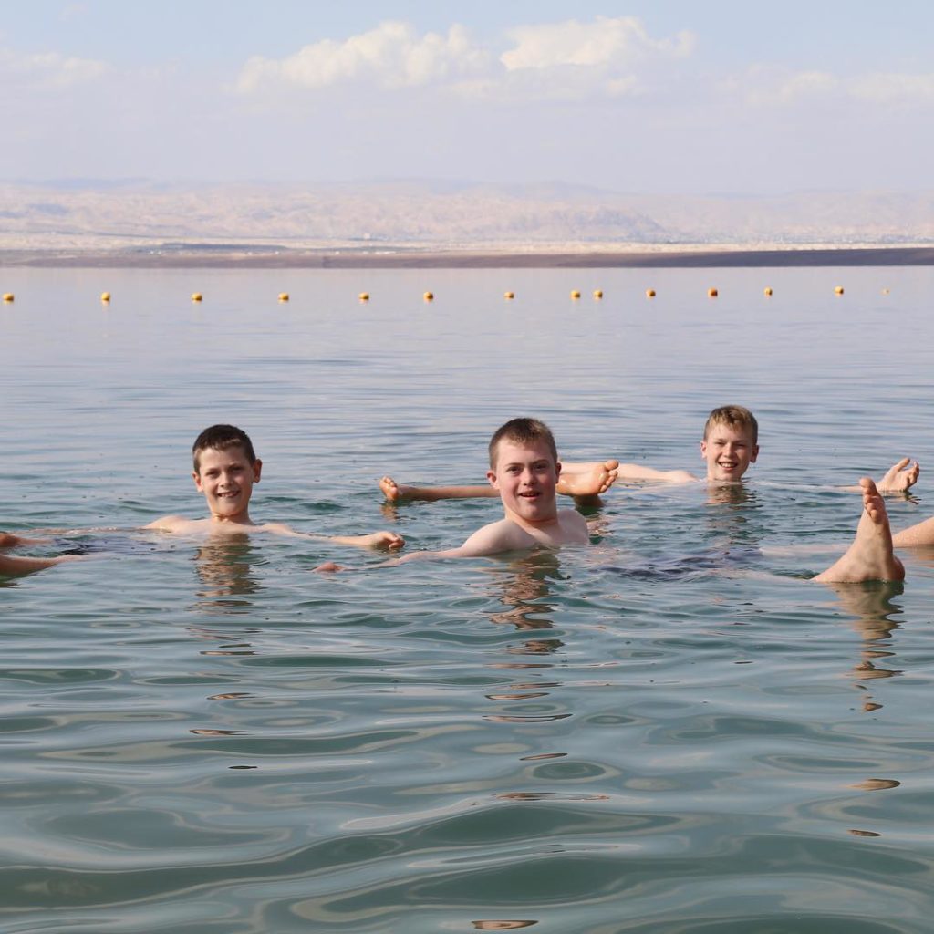 Children floating in the Dead Sea in Jordan