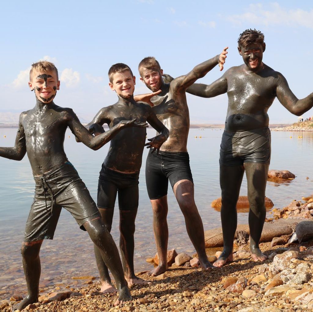 Covered in mud at the Dead Sea