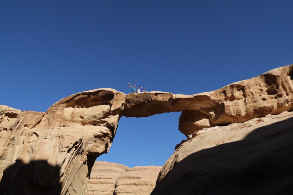 Standing atop Um Forth Rock Bridge in Wadi Rum