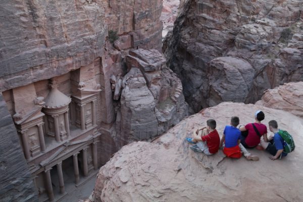 Looking down on the Treasury at Petra with kids!