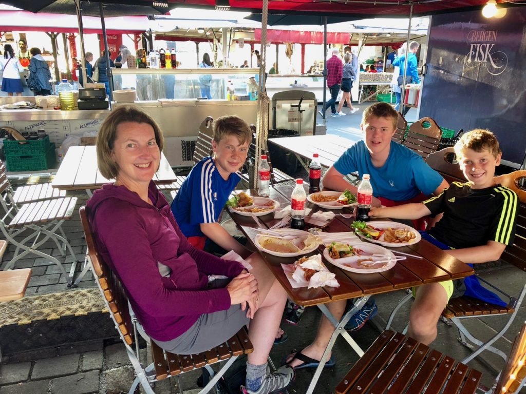 Street stalls in Bergen selling seafood, fish and chips and even reindeer burgers!