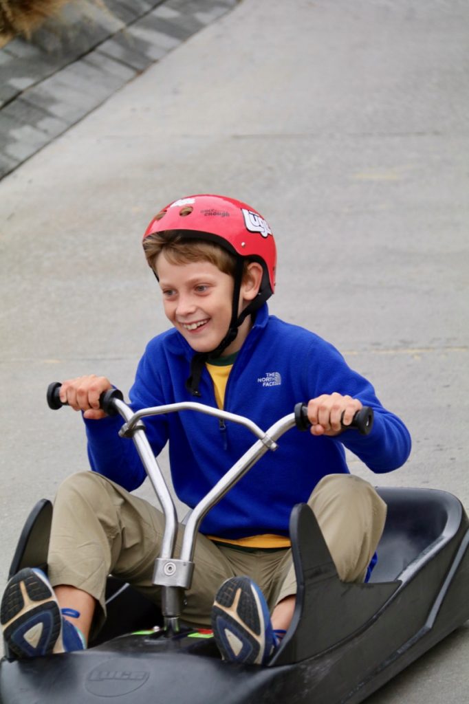 Riding the Queenstown luge in New Zealand